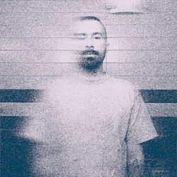 a grainy, monochrome blue image of Nico, the author of this website